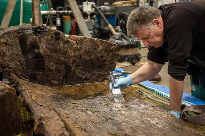 An up-close look at the Tetney Bronze Age coffin during restoration work.