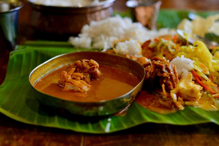 A banana leaf meal spread out and ready to eat